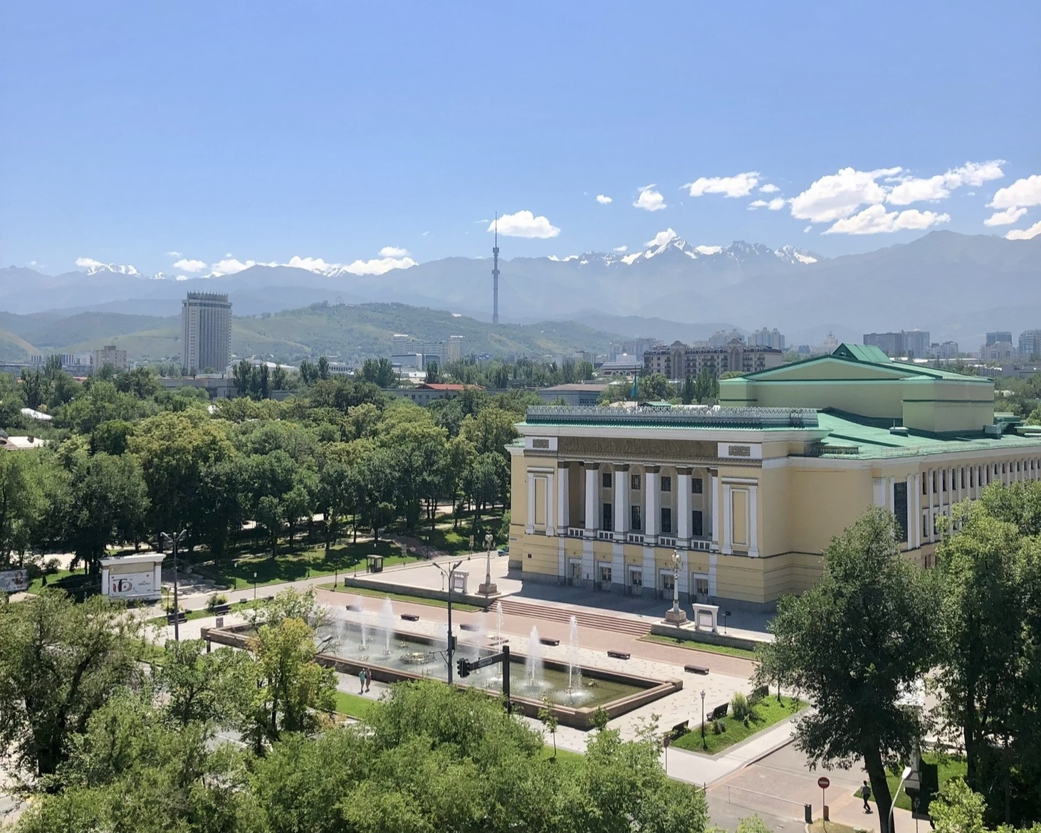 Abay Opera House in the forground with Tien Shan Mountains in the back