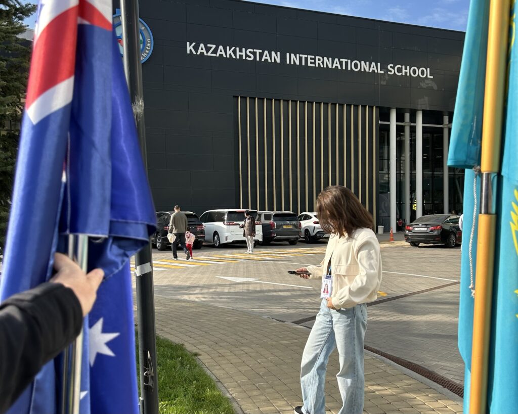 A photo of Kazakhstan International School during a rehearsal for the flag parade for International Day